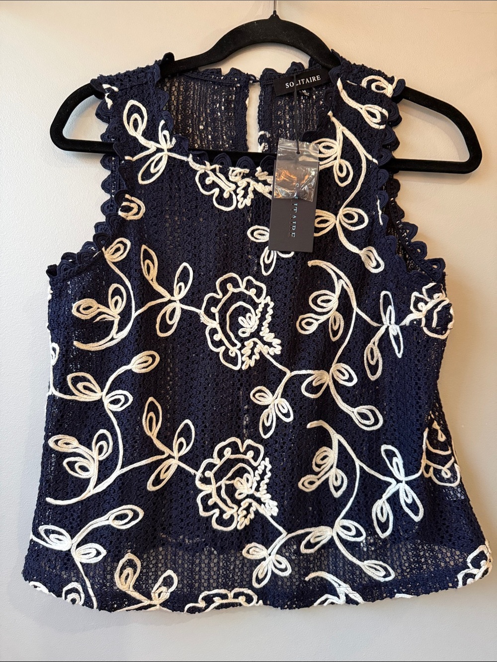 Solitaire Navy Crochet Tank with White Floral Appliqué mesh like medium